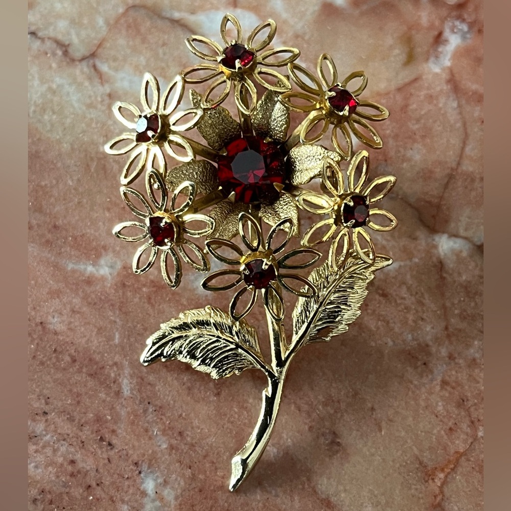 Gold-Tone Floral Brooch with Red Crystal Accents